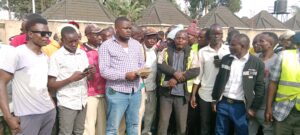 Lendrix's Personal Assistant Moses Wamoto hands over Sh200,000 to Webuye West Boda Bodas.